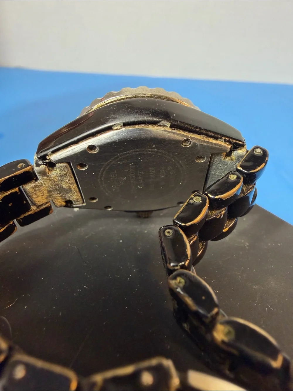 Chanel J12 women's wristwatch with a black ceramic case and bracelet and a bezel